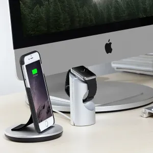 Just Mobile Quattro Back leather case on iPhone 6s Plus, shown upright on a desk charging stand.