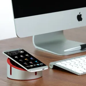 Just Mobile AluCup Grande Smartphone-Ständer aus rotem Aluminium mit Kabelnut, hält ein Smartphone auf einem Schreibtisch