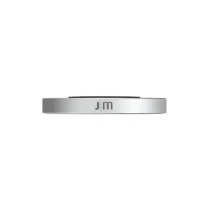 Just Mobile aluDisc mini magnetisk väggmonteringsskiva i silver med JM-logotyp, visad från sidan