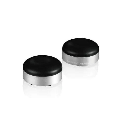 Just Mobile Lazy Couch, två runda lågprofilsstativ med svart ovansida och silverfärgad metallbas, höger enhet visar logotyp.