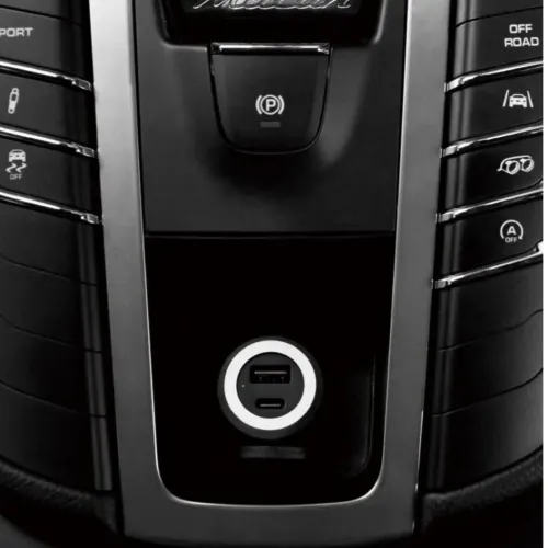 Just Mobile Highway Turbo car charger in black with round aluminum ring, USB-A and USB-C ports, mounted in the car center console.