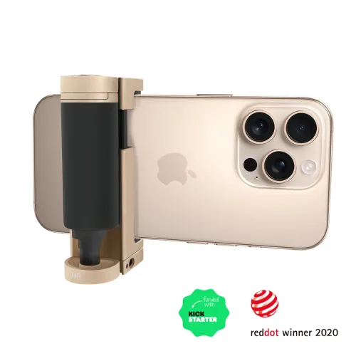 ShutterGrip 2 guld för smartphone med svart texturerat handtag och klämfäste som håller en telefon horisontellt, rund bas.